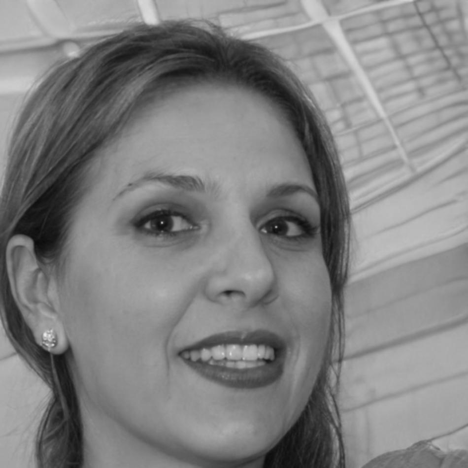 Professional woman with blonde hair in business attire